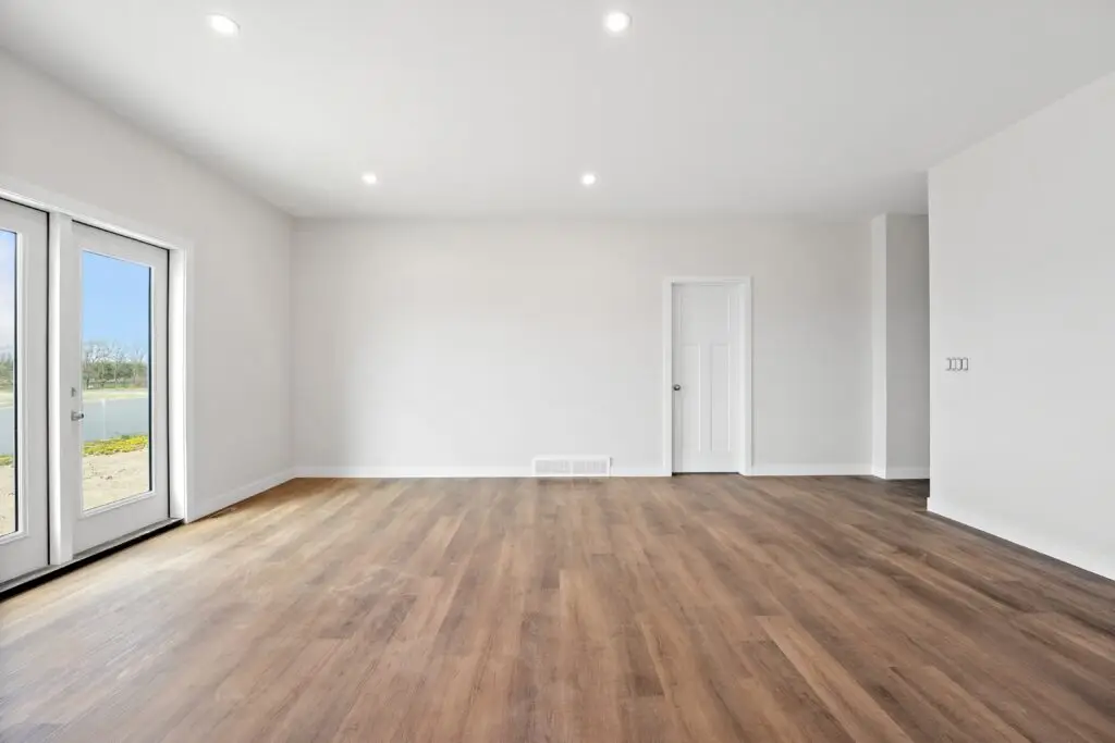 beautiful new hardwood floors in a home with white walls