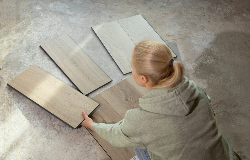 women contemplating luxury vinyl flooring benefits and options